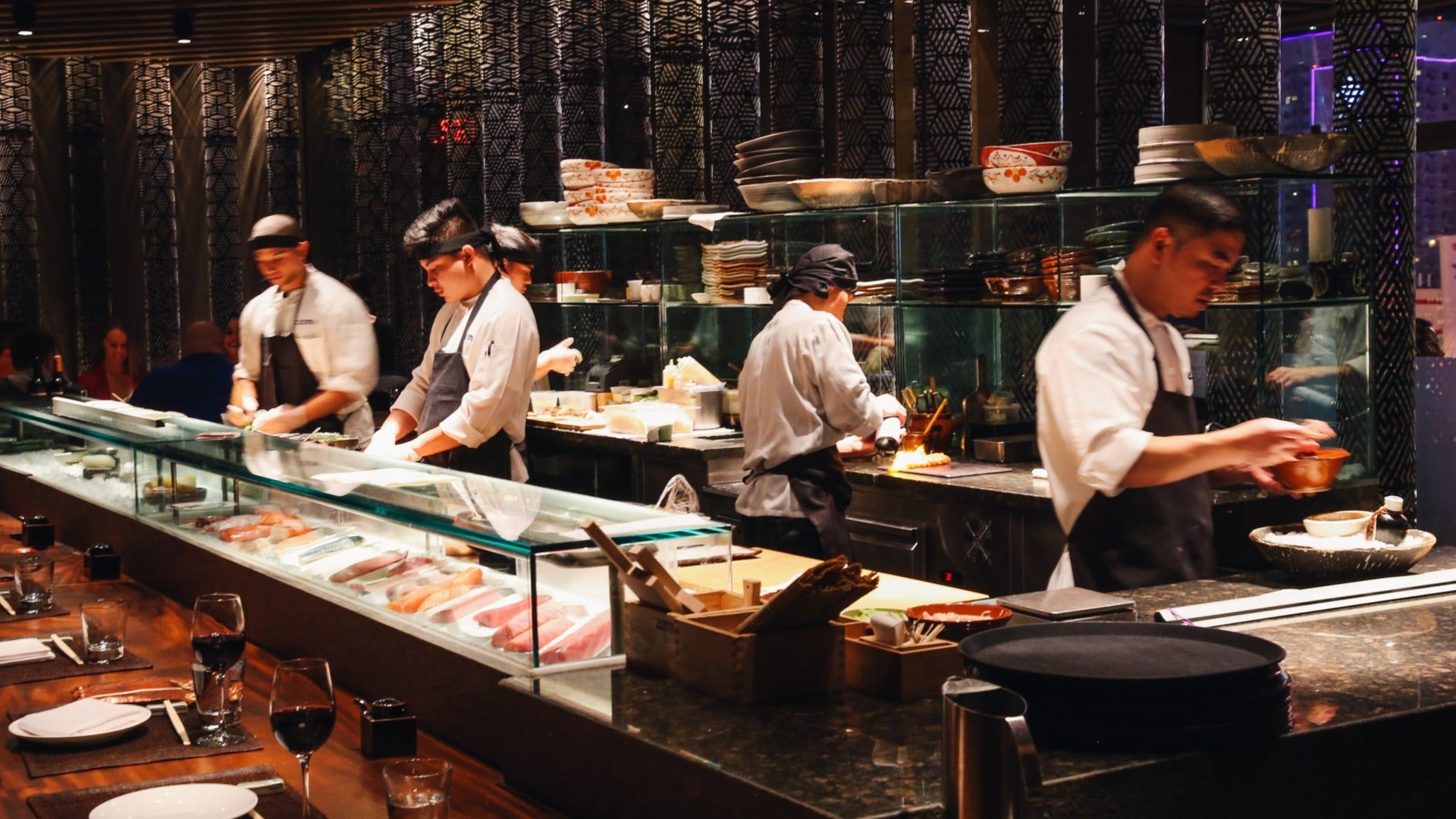 chefs at dinner service, sashimi and sushi with bowls at the back at zuma, cosmopolitan hotel las vegas